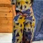 Dyed criss-crossed short sleeve shirt with palazzo pants to match.